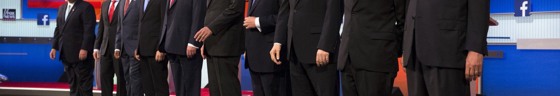 Republican presidential candidates from left, Chris Christie, Marco Rubio, Ben Carson, Scott Walker, Donald Trump, Jeb Bush, Mike Huckabee, Ted Cruz, Rand Paul, and John Kasich take the stage for the first Republican presidential debate at the Quicken Loans Arena Thursday, Aug. 6, 2015, in Cleveland. (AP Photo/John Minchillo)